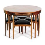 Hans Olsen for Frem Rojle - A teak dining table, together with four black vinyl upholstered chairs,