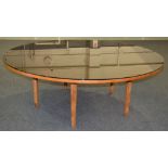 Amended description - Attributed to Gordon Russell Furniture - A circular dining or boardroom table,