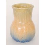 Ruskin Pottery - A small crystalline glaze vase decorated in a streaked yellow to orange to blue