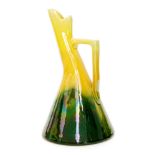 In the manner of Christopher Dresser - Bretby - A shape 820 modernist jug glazed in yellow to green,