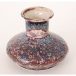 Cobridge Pottery - A small contemporary vase of compressed globe and shaft form decorated with an