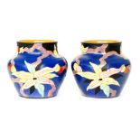 Carlton Ware - A pair of 1930s Art Deco Handcraft vases decorated in the Stellata or Wild Cherry