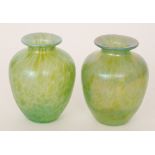 In the manner of Loetz - A pair of glass vases of shouldered form below a short flared collar neck