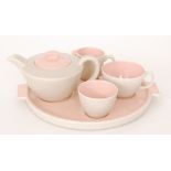 Poole Pottery - A 1950s two-tone breakfast set comprising teapot for one, teacup,