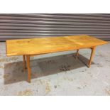 Amended description - Trevor Chinn for Gordon Russell Furniture - A rectangular oak coffee table on