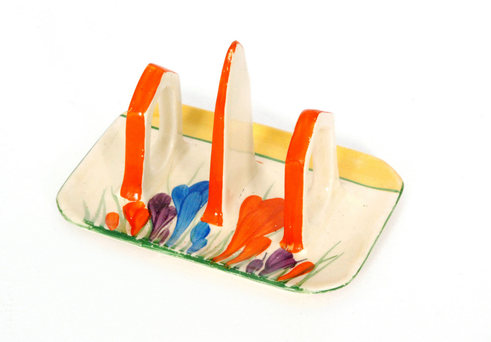 Clarice Cliff - Crocus - A three bar toast rack with rectangular base circa 1930 hand painted with