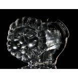 Lars Hellsten - Skruf - A post war crystal glass figure depicting a stylised lion in moulded relief,