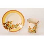 Clarice Cliff - Sunshine - A Tankard shape coffee can and saucer circa 1931,