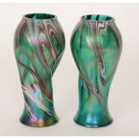 Kralik - A pair of early 20th Century glass vases of wrythen tapering form decorated with pulled