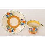 Clarice Cliff - Crocus - A conical cup and saucer circa 1930 hand painted with Crocus sprays