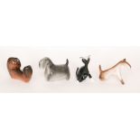 Cmielow - A group of four post war stylised figures comprising a cat by Zdana Kosicka,