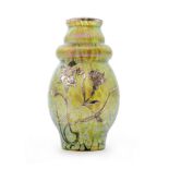 Loetz - An early 20th Century glass vase of swollen form below a knopped neck decorated with