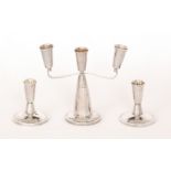 David Lawrence Silverware - A 1960s hallmarked silver three piece candelabra and matching dwarf