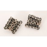 Unknown - A pair of mid-century silver Brutalist clip earrings of square section made from tight