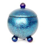 Loetz - An early 20th Century Papillon glass bowl and cover of spherical form raised on three ball