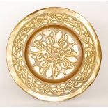 Unknown - A brass Arts and Crafts charger with stylised flower head to the centre,