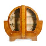 Unknown - A walnut veneered 'Alarm Clock' cabinet,