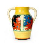 Clarice Cliff - Umbrellas - A twin handled Lotus jug circa 1930,