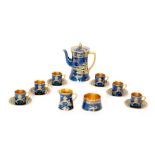 Wiltshaw and Robinson Carlton Ware - A 1920s Art Deco coffee set decorated in the Barge pattern