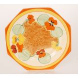 Clarice Cliff - Nasturtium - A large octagonal plate circa 1933 radially hand painted with stylised
