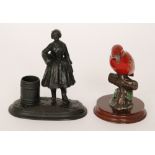 A painted brass figure of a kingfisher on mahogany turned base and a bronzed figure of a milkmaid