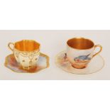 A matched Royal Worcester cabinet coffee cup and saucer decorated by Maybury,