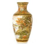 A Japanese Meiji period miniature Satsuma vase hand decorated with a Pagoda to a lake scene with