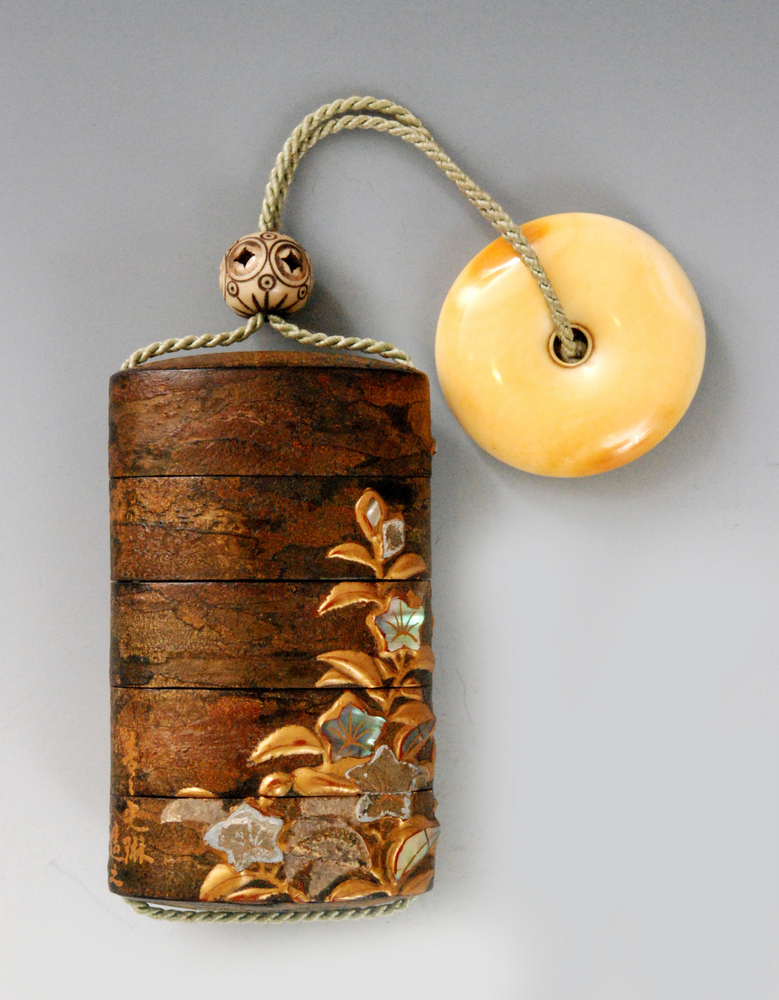 A 19th Century four case cherry bark inro decorated in takamakie with flowering plants in pewter - Image 2 of 8