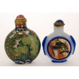 An early 20th Century Chinese cloisonnie snuff bottle of compressed circular form decorated with a