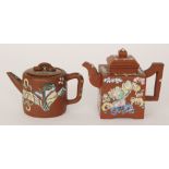 Two Chinese Yixing teapots, the first of square form enamel decorated with two figures in a garden,