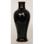 A Chinese mei-ping vase glazed in an all over brown glaze, unmarked,