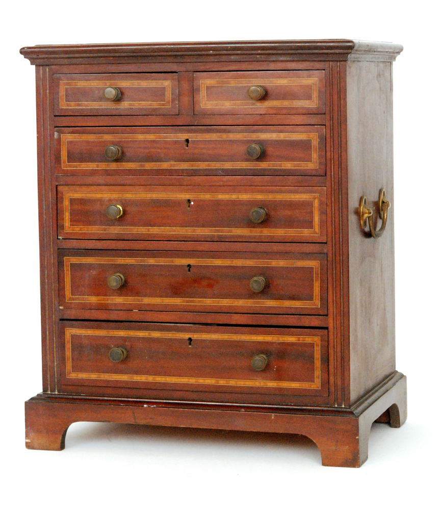 An Edwardian mahogany and satinwood crossbanded apprentice chest of two short and four long