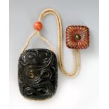 A late 19th Century three case guri lacquer inro deeply carved with swirling curls, length 9cm,