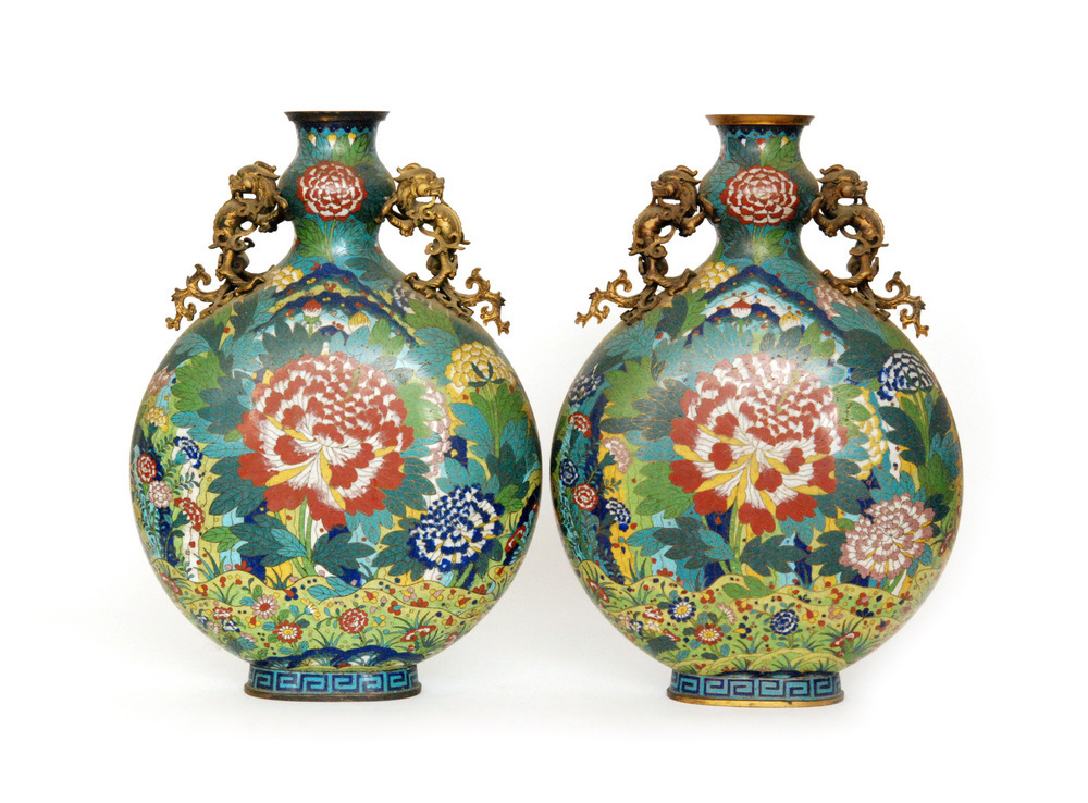 A pair of 19th Century cloisonné vases of archaic hu form each decorated with a central