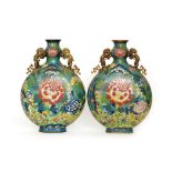 A pair of 19th Century cloisonné vases of archaic hu form each decorated with a central