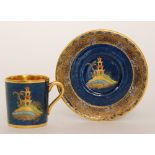 A 1920s Wiltshaw and Robinson Carlton Ware coffee can and saucer decorated with gilt and enamel