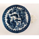 An early 19th Century blue and white egg drainer decorated in the Fisherman and Cormorant pattern