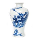A Chinese Qing Dynasty 18th Century porcelain vase of baluster form hand painted in underglaze blue
