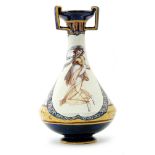 A late 19th Century maiolica vase decorated with a hand painted cartouche with a classical lady