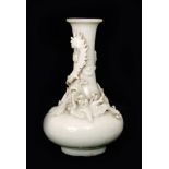 A Chinese Qing Dynasty late 17th to early 18th Century porcelain vase of footed low shouldered form