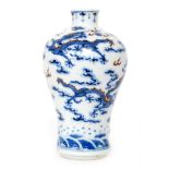 A Chinese Qing Dynasty 18th Century porcelain vase of baluster form hand painted in underglaze blue