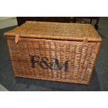 A wicker picnic hamper, stenciled Fortnum & Mason width 76cm, together with another case.