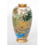 An early 20th Century Japanese Soko China Satsuma baluster vase panel decorated with a house before