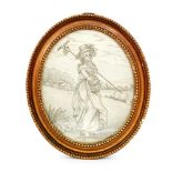 An early 19th Century framed silk needlework depicting a young lady in Regency dress holding a
