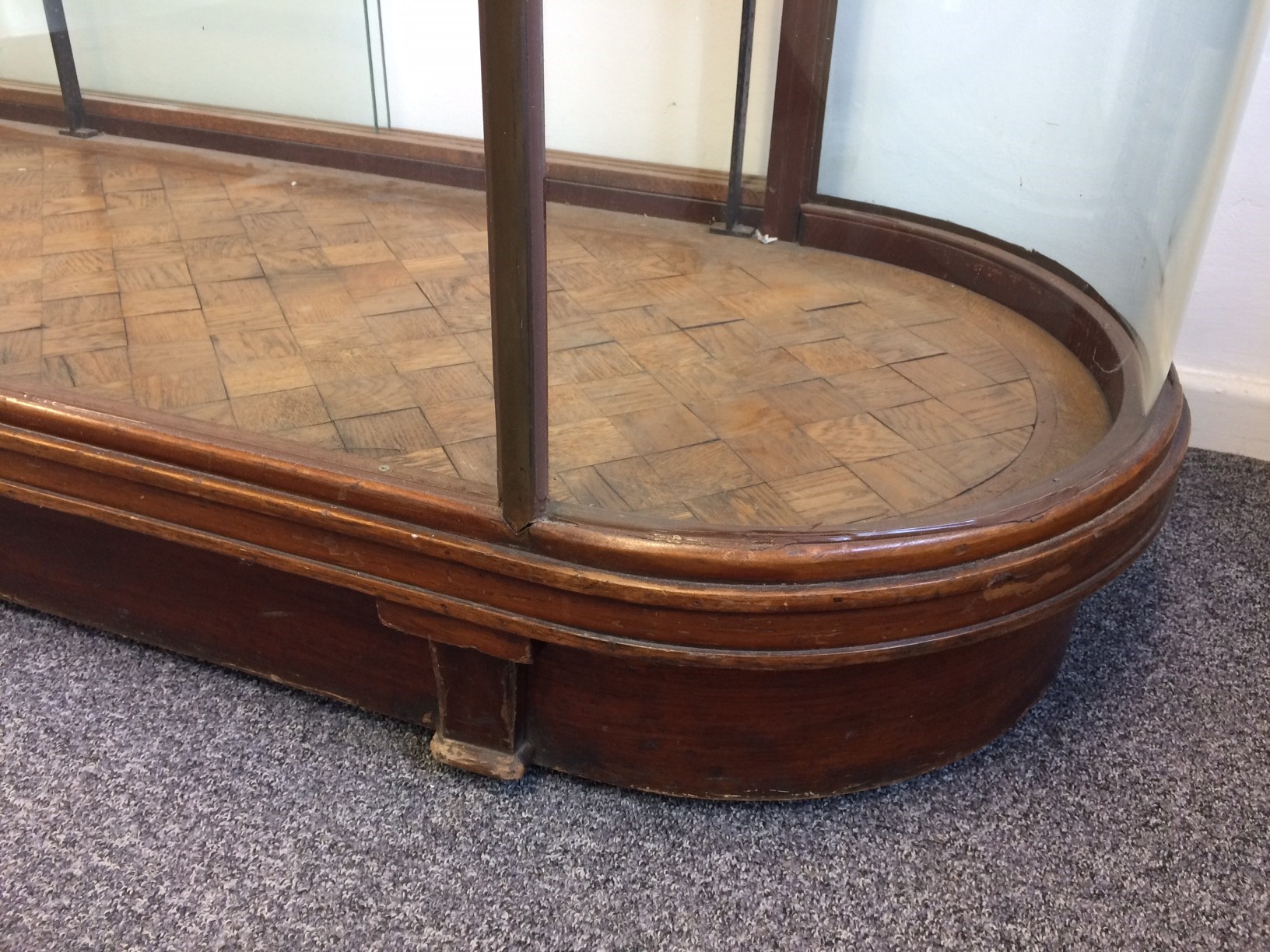 An early 20th Century brass framed and glazed shop display counter with D shaped ends, - Image 3 of 3