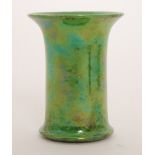 A small 1920s Ruskin Pottery flared vase decorated in an apple green lustre with dark tea dust type