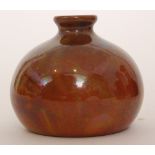 An early 20th Century Bernard Moore vase of compressed ovoid form decorated in a tonal brown lustre