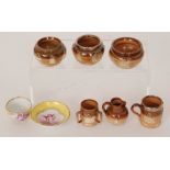 Six Doulton Lambeth stoneware miniature items to include a silver mounted mug and bowl, a tyg,