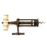 A 19th Century bone handled steel twin pillar rack and pinion corkscrew in the manner of Lund,