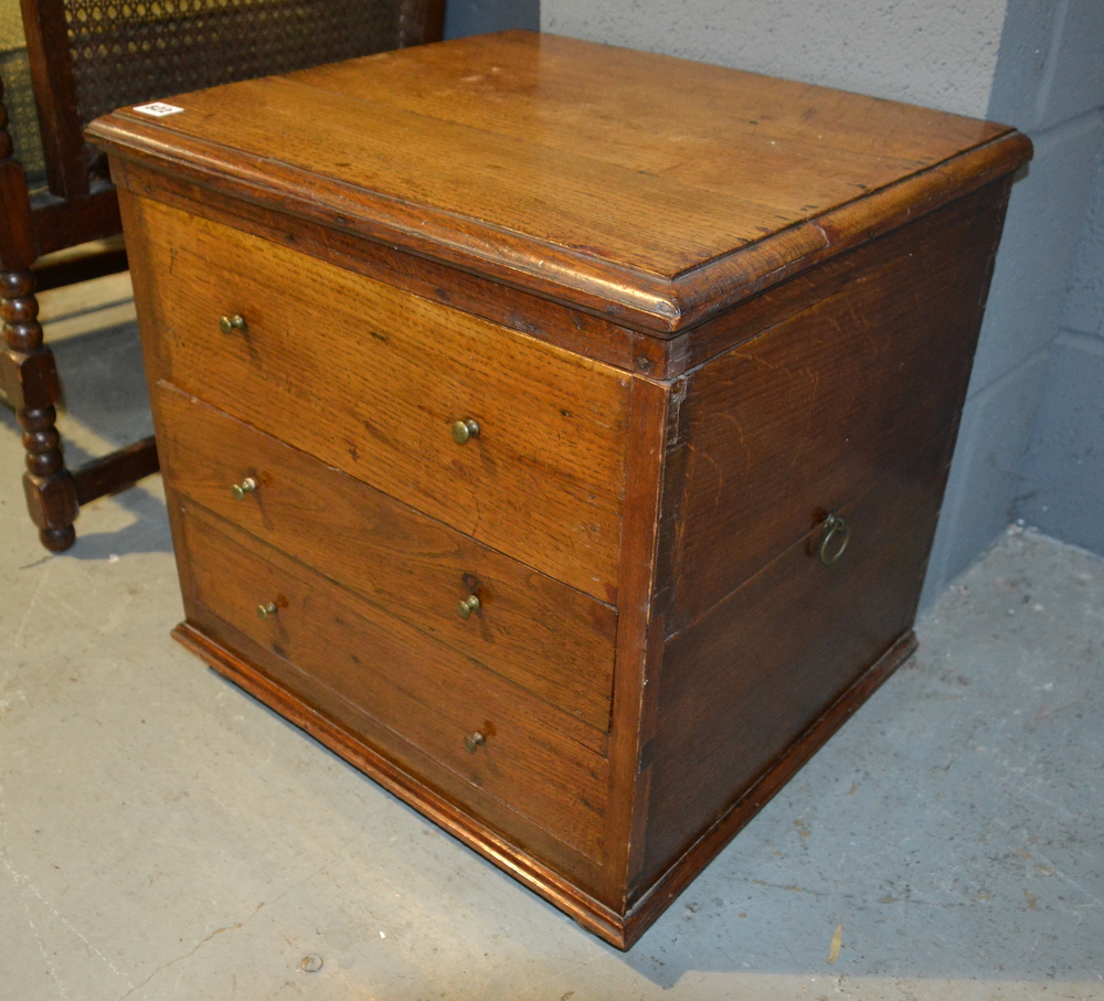 A 19th Century mahogany square commode the moulded edge top above two drawers,